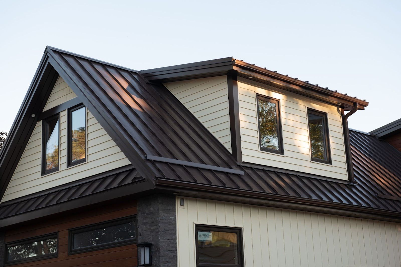 A house with a clean metal roof.